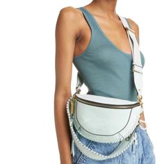 Isabel Marant Skano Suede Shoulder Bag In Celadon Msrp$765 The Impression The Isabel Marant Skano Suede Belt Bag Will Leave On Your Friends Is One That Will Surely Last! Smooth Leather In Light Blue Shapes This Alluring Bag With A Slip Pocket And A Top Zip Closure That Opens To Reveal A Roomy Main Compartment To Keep Your Party Essentials. Wear It Around The Waist With Its Removable Adjustable Belt Or Attach Its Adjustable Crossbody Strap To Wear It As A Crossbody. Pair With Anything From Denim Party Essentials, Suede Belt, Moon Shape, Flowing Dresses, Find Color, Parisian Chic, Adjustable Belt, Crossbody Strap, Half Moon