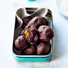 there are some chocolate candies in the tin