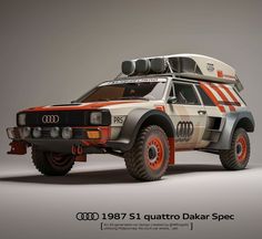 an old car with orange rims is shown in this ad for the audi quatro dakar spec