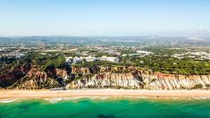 an aerial view of a beach and the ocean