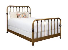 a metal bed frame with white sheets and pillows on top of it, against a white background