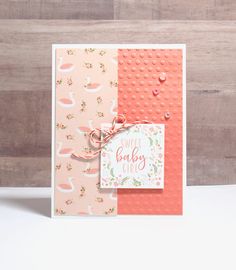 a card made with pink and orange paper, featuring the words sweet baby on it