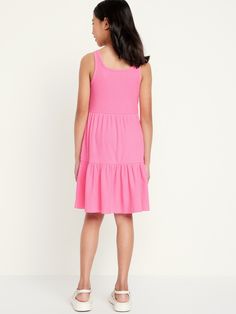 scoop neck sleeveless arm openings seamed at waist tiered skirt on-seam pockets relaxed fit defined waist hits approx.  at kneemachine wash according to the care instruction label Plus Size Dresses, Defined Waist, Girls T Shirts, Dress For Girls, Tier Skirt, Old Navy Dresses, Tiered Skirt, Tiered Dress, Pink Dress