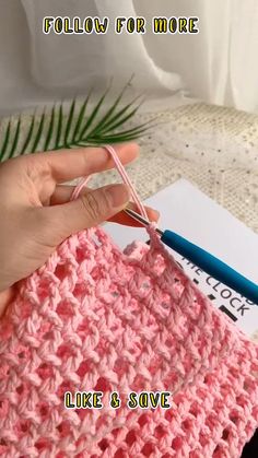 someone is crocheting the stitchs on their pink knitted blanket with text overlay that reads, follow for more like & save