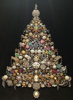 a christmas tree made out of buttons and other items