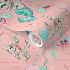 a pink wallpaper with mermaids and seahorses in pastel colors on it