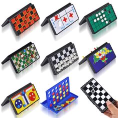 a hand holding a game set in different colors and shapes, all with matching pieces