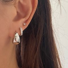 These silver hoops are Chubby Chunky and Thick that have teardrop shape. Simple and basic but surely big enough to make statement. They can be worn everyday and with every outfit. Come in Gold and Silver finish. Material: white gold plated on brassMeasurement: 17mm x 15mm , the thickness part of the hoop: 10mm (1cm)Nickel free and Lead free, HypoallergenicSold as a pair. ♡ Have any questions or need advice on your order? Feel free to contact us. We are fast to reply. ♡ All orders are going out n Silver Hoop Earrings Thick, Simple Statement Earrings, Thick Hoops Earrings, Chunky Hoops Silver, Teardrop Earrings Silver, Statement Jewelry Silver, Jewellery Silver Earrings, Trendy Silver Earrings, Ear Piercings Sliver