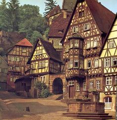 an old european town with half - timbered buildings
