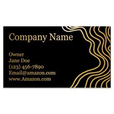 a black and gold business card with wavy lines