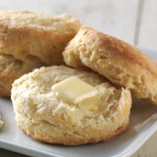 biscuits and butter on a white plate
