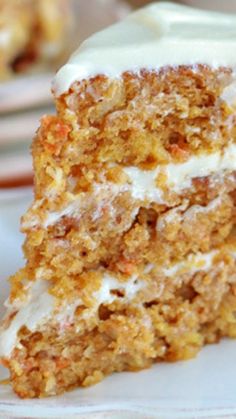 a piece of carrot cake with cream cheese frosting