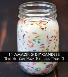 a jar filled with sprinkles sitting on top of a table