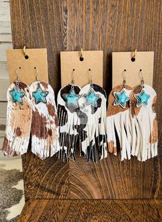 Cowhide turquoise star earrings are the perfect accessory for showcasing your cowgirl spirit. These western jewelry pieces are a unique gift for your girlfriend, adding a punch of style to any outfit. Embrace your adventurous side with these stunning earrings. #CowgirlSpirit #WesternJewelry #GiftForGirlfriend #PunchyJewelry Leather Tassel Earrings, Jewelry Western, Rodeo Fashion