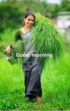 a woman carrying grass on her back in a field with the words good morning written across it