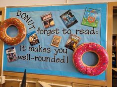 a bulletin board with donuts and magazines on it