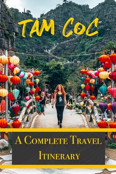 a woman walking across a bridge with lanterns hanging from the ceiling and text overlay that reads, tam coc a complete travel itinerary