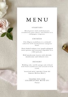 a menu card with flowers on it