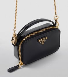 This bag embodies all there is to love about Prada in miniature form, sleek lines meet glossy patent leather in the body, while the brand's iconic Triangle hardware is showcased in centre stage. Pouch Outfit, Mini Pouch, Womens Fragrances, Leather Mini