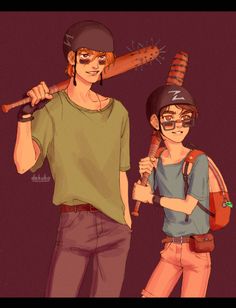 two people standing next to each other with baseball equipment on their heads and one holding a bat