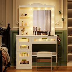 a white vanity with lights on it in a room