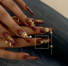 Red Gold Nails Aesthetic, Gold And Wine Nails, Red Nails Gold Charms, Y2k Aura Nails, Long Nails Charms, Red Almond Nail Designs, Red Gold Black Nails, Nails Gold And Red, Nails With Gold Charms