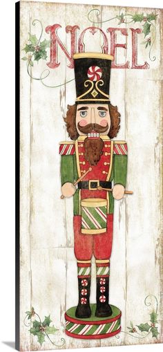 a wooden sign with a nutcracker on it's face and the word noel written