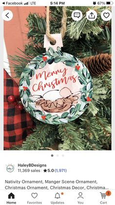 an ornament hanging from a christmas tree with the words merry christmas on it