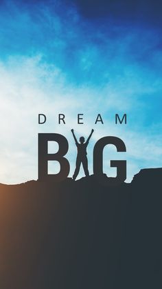 a person standing on top of a mountain with their arms in the air and text reading dream big