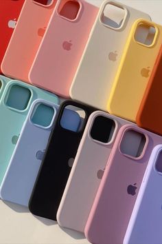 an iphone case is lined up in different colors