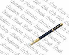 a pen sitting on top of a piece of paper with the words written in cursive writing