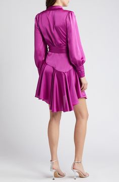 Artful draping, tying and pintucking will have you looking pretty as a flower in this satin, wrap-style minidress framed by voluminous balloon sleeves. True wrap style with side tie closure Surplice V-neck; shawl collar Long sleeves Unlined 90% polyester, 10% spandex Hand wash, line dry Made in the USA Lund, You Look Pretty, Balloon Sleeves, Shawl Collar, Balloon Sleeve, A Flower, Wrap Style, Bright Pink, How To Look Pretty