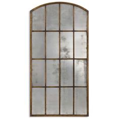 an arched window with glass panels and metal bars on the sides, against a white background