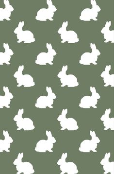 the silhouettes of rabbits are shown against a green background with white outlines on it