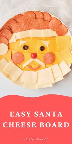 an easy santa cheese board for kids to make with cheese and crackers on top