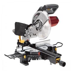 a miter saw is being used to cut wood