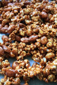 caramel coated nuts are sitting on a table