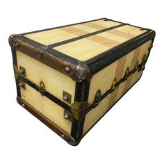 an old fashioned trunk is shown on a white background with clippings to the bottom