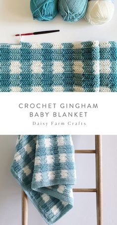 the crochet gingham baby blanket is next to two balls of yarn