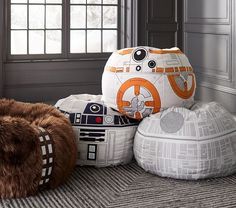 star wars themed pillows and bean bags on the floor