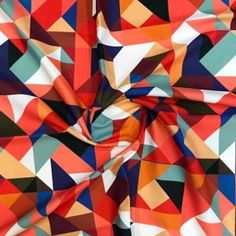 an image of a colorful fabric that looks like it is made out of geometric shapes
