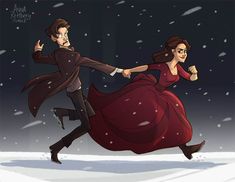 a man and woman dressed in red running through the snow with their arms around each other