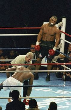 two men in the ring during a boxing match