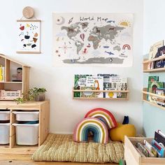 a child's room with toys and books on the shelves, including a rug