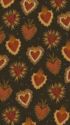 an image of hearts and stars on a black background with red, orange, yellow and brown colors