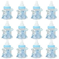 twelve baby bottles with blue bows on the top and one empty bottle in the middle