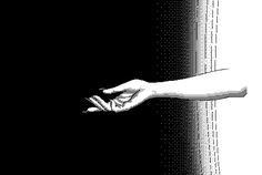 two hands reaching for each other in front of a black and white background with dots