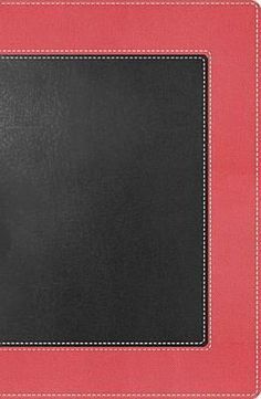 a red and black leather book with stitching on the front, cover is blank