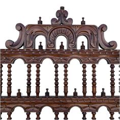 an old wooden shelf with ornate carvings on it