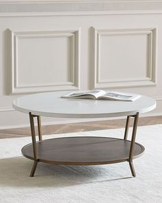 a white table with a book on top